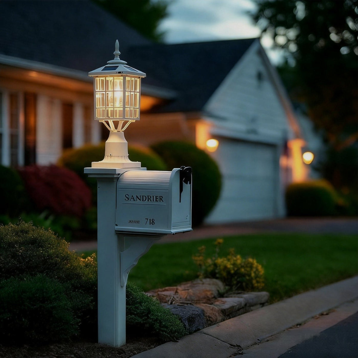 Kemeco compact white solar post light installed on outdoor post near garden